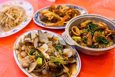 Photo for Taiwanese local cuisine with different dishes in seafood store - Royalty Free Image