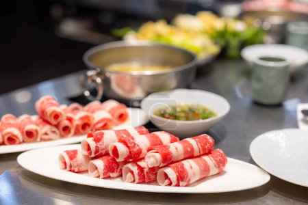 Photo for Slice of fresh raw beef roll in restaurant - Royalty Free Image