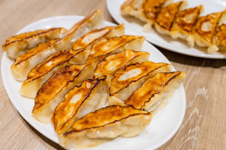 Photo for Japanese pan fried dumpling in restaurant - Royalty Free Image