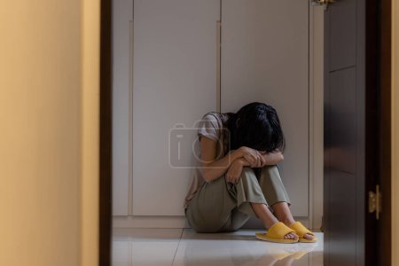 Photo for Hopeless woman sit on floor and feel so sad - Royalty Free Image