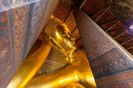 Photo for Reclining Buddha figure in Wat Pho Buddhist temple - Royalty Free Image