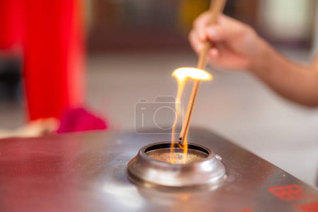Photo for Burning incense on the gas burner - Royalty Free Image