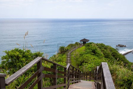 Photo for Wooden step hiking trail over the mountain with the sea view - Royalty Free Image