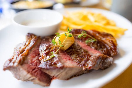 Photo for Grill beef steak with French fries in restaurant - Royalty Free Image