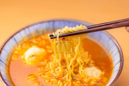Photo for Spicy korean instant noodles with meat ball - Royalty Free Image