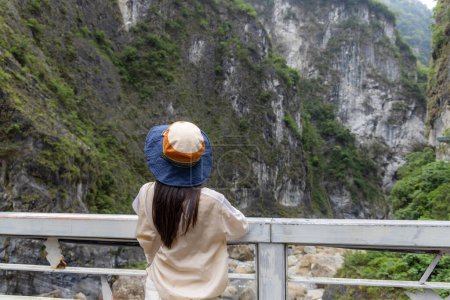 Woman look at the scenery in Hualien taroko Gorge at Hualien Taroko