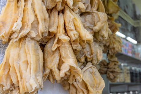 Photo for Dry fish maw hanging at the store for selling - Royalty Free Image