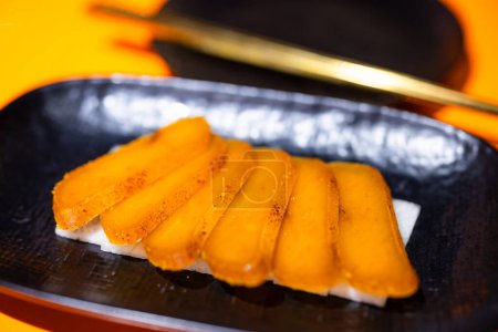 Téléchargez les photos : Tranche de plat taïwanais d'oeufs de mulet secs - en image libre de droit