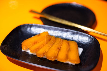 Photo for Slice of Taiwanese dry mullet roe dish - Royalty Free Image