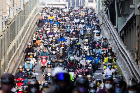 Photo for Taipei, Taiwan - 19 April 2023: Crowd of motorcycles over the Taipei bridge - Royalty Free Image