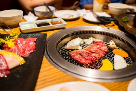 Photo for Japanese style bbq in restaurant - Royalty Free Image