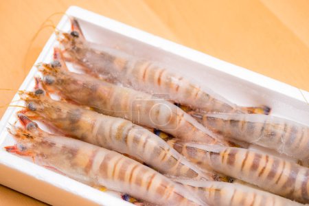 Photo for Frozen shrimp in foam package - Royalty Free Image