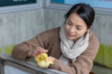 Photo for Woman hold with little duck - Royalty Free Image