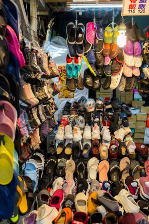 Photo for Taipei, Taiwan - 18 October 2023: Shoe selling in Nanjichang street market in Taipei - Royalty Free Image