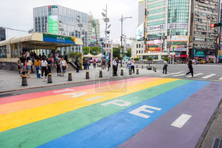Photo for Taipei, Taiwan - 13 September 2023: Taipei city street in Ximending with rainbow painting on the road - Royalty Free Image
