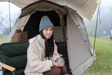 Photo for Woman go camping site in the winter time - Royalty Free Image