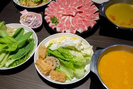Photo for Delicious hotpot with fresh beef and vegetable in restaurant - Royalty Free Image