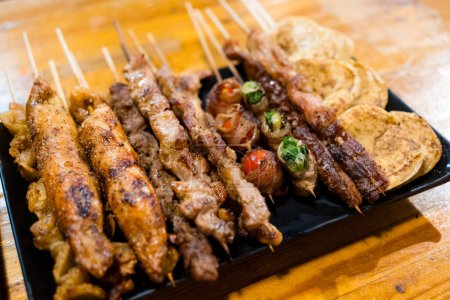 Photo for Satay skewered and grilled meat - Royalty Free Image