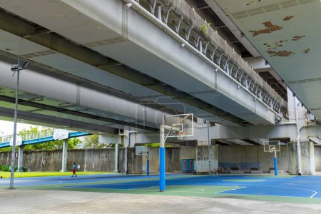 Photo for Taipei, Taiwan - 25 July 2023: Basketball court under the overpass - Royalty Free Image