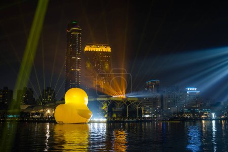 Photo for Taiwan - 01 February 2024: Yellow duck in kaohsiung bay in Taiwan at night - Royalty Free Image