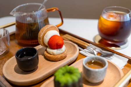 Photo for Strawberry dessert with coffee and tea in cafe - Royalty Free Image