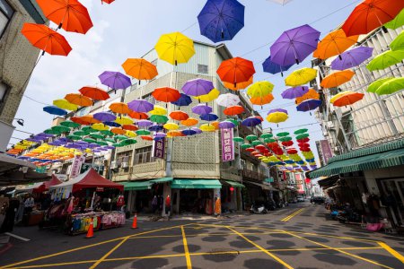 Photo for Taiwan - 02 February 2024: Colorful Umbrellas Hanging In Hou Yi Shopping Street in Kaohsiung of Taiwan - Royalty Free Image