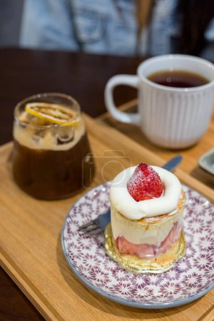 Photo for Strawberry cake with coffee in restaurant - Royalty Free Image