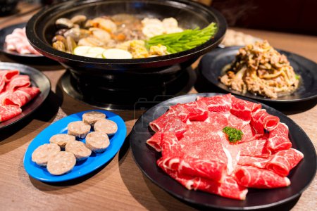 Photo for Table of delicious hot pot food - Royalty Free Image
