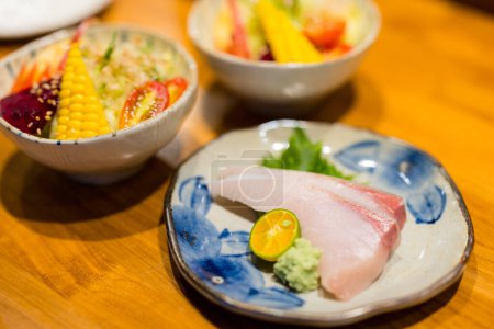 Photo for Slice of the sashimi fish in the Japanese restaurant - Royalty Free Image