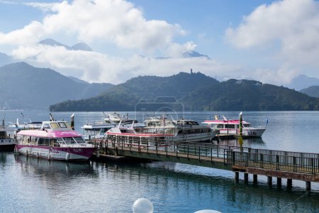 Photo for Nantou, Taiwan - 19 October 2022: Pier dock in the sun moon lake at Taiwan - Royalty Free Image