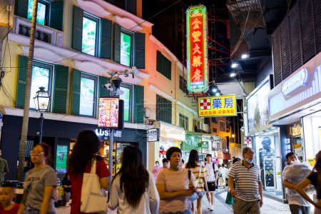 Foto de Macau 28 June 2023: Souvenir shop street in Macau city at night - Imagen libre de derechos