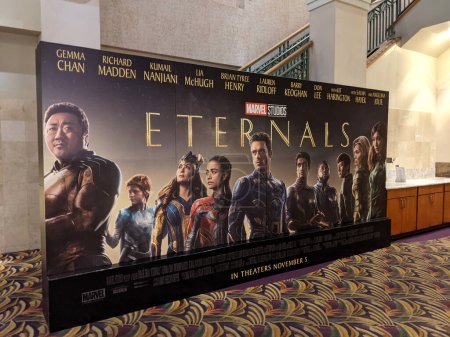 Photo for Honolulu - November 1, 2021: Eternals movie poster inside movie theater at the Ward Village. - Royalty Free Image