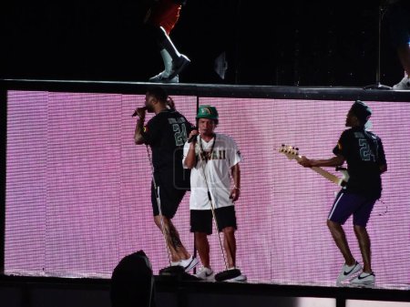 Photo for Honolulu - November 8, 2018:  Bruno Mars sings into mic on stage during Concert in Hawaii at the Aloha Stadium. - Royalty Free Image