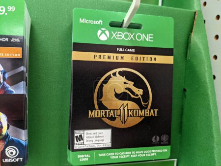 Foto de Honolulu - September 28, 2019: Xbox One Mortal Kombat 11 Premium Edition Full Game Digital Code by WB Games for sale at Target Store. - Imagen libre de derechos