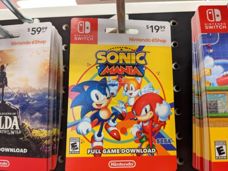 Foto de Honolulu - September 28, 2021: Nintendo Switch digital games Sonic Mania Full Game Download cards for sell on Display inside Target store. Nintendo Switch is designed to go wherever you do, transforming from home console to portable system in a snap - Imagen libre de derechos