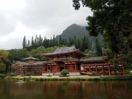 Photo for Experience tranquility and peace at the stunning Byodo-In Temple, nestled in the lush Oahu countryside. With its majestic architecture and serene surroundings, this temple is a true hidden gem of Hawaii. Step inside and immerse yourself in the soothi - Royalty Free Image
