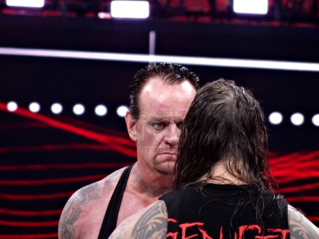 Photo for SANTA CLARA - MARCH 29: WWE Wrestler the Undertaker stares across at Bray Wyatt in ring before start of match at Wrestlemania 31 at the Levi's Stadium in Santa Clara, California on March 29, 2015. - Royalty Free Image