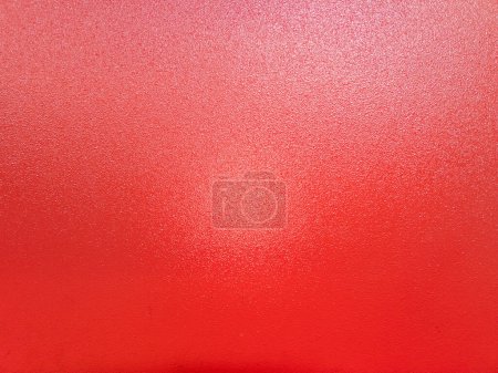 Photo for Background of red shagreen powder paint coating on flat sheet steel surface. - Royalty Free Image
