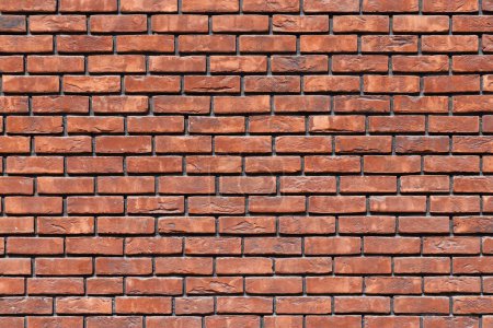close up of a red brick wall - full-frame background and texture.