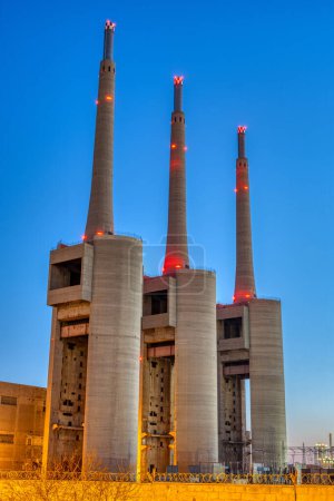 Photo for The disused thermal power station at Sand Adria near Barcelona at dusk - Royalty Free Image