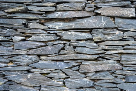 Photo for Background from an old natural slate stone wall - Royalty Free Image