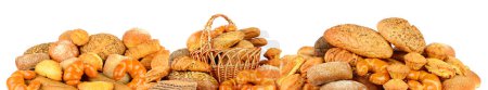 Panoramic photo fresh bread products and variety buns isolated on white background.