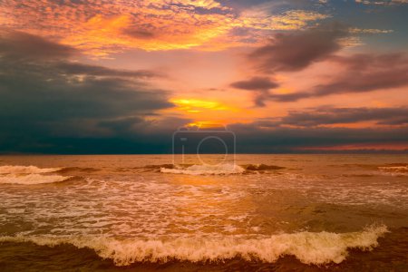 Photo for Beautiful colorful sunrise over the sea and dramatic clouds - Royalty Free Image