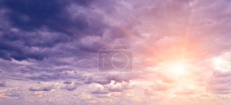 Photo for Bright majestic dawn against gray stormy sky. - Royalty Free Image