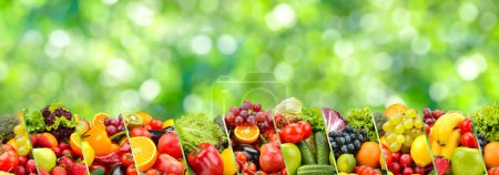 Photo for Berries, fruits and vegetables on green blurred background. - Royalty Free Image