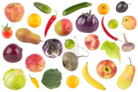 Téléchargez les photos : Grande série de fruits et légumes tombants isolés sur fond blanc. - en image libre de droit