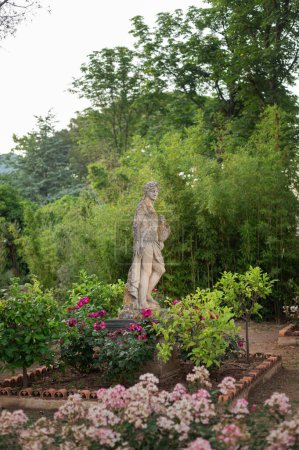 Photo for Shady and cozy historic garden of Villa Cimbrone in the village of Ravello in southern Italy. Easy and pleasant European vacation. Garden statue - Royalty Free Image