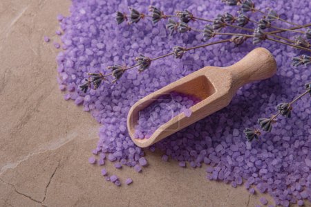 Photo for Lavender cooking salt close-up with a wooden spoon, background - Royalty Free Image