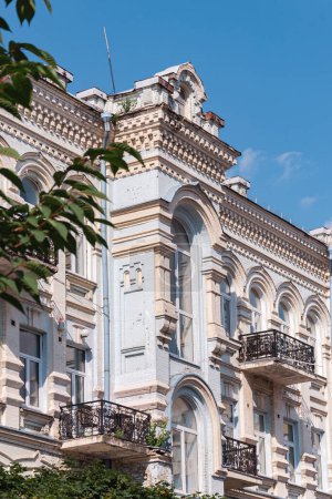 Photo for Facades of buildings of the 19th century in the yard near Academic Theater of Opera and Ballet on Volodymyrska Streets in Kyiv. The ancient architecture of the capital in the Baroque style. Postcard - Royalty Free Image