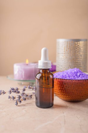 Photo for Serum for face and hair care with lavender extract. Aromatherapy and spa, relaxation - Royalty Free Image